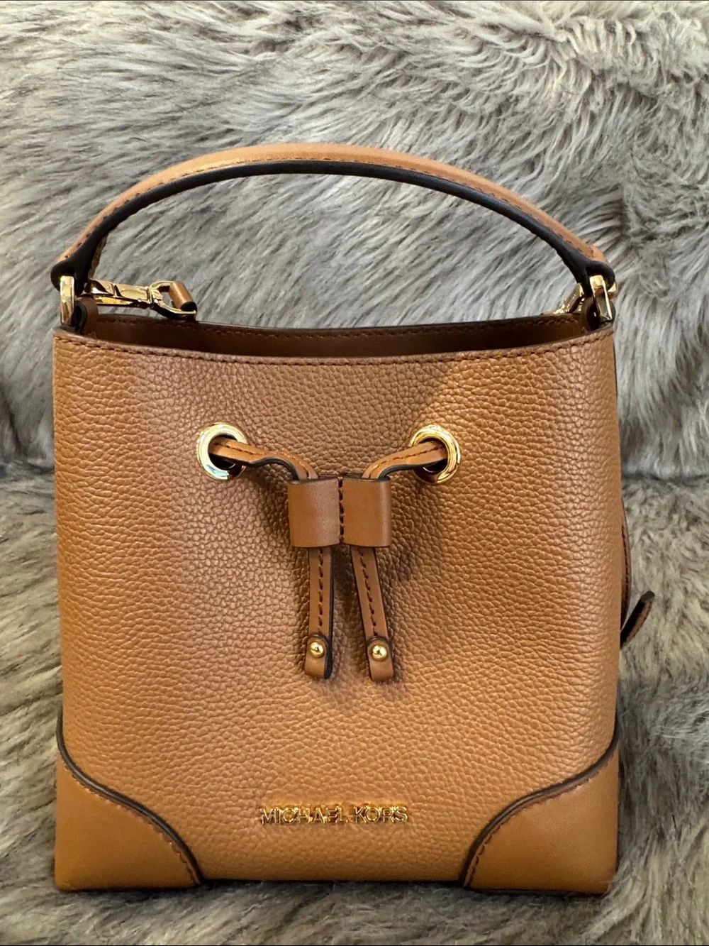 Michael Kors Cognac Pebbled Leather Mini Drawstring Bucket/Crossbody Bag